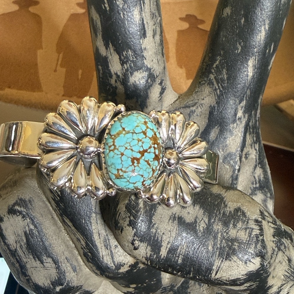 Sterling Silver and Turquoise Floral Cuff
Large Turquoise stone
